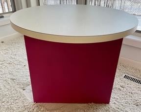 This excellent contemporary end table measures 21 inches tall and is 28 inches in diameter.