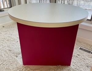 This excellent contemporary end table measures 21 inches tall and is 28 inches in diameter.