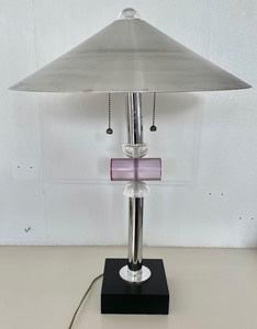 This contemporary lamp measures 26 inches tall and is very good condition. 