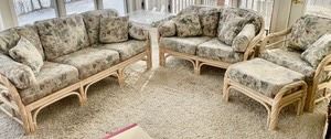 This 4 piece set by BenchCraft includes a couch, loveseat, chair and ottoman. The sofa measures 76x31x32 inches. The corner table in the photos is not included. Items are in good condition with light wear.