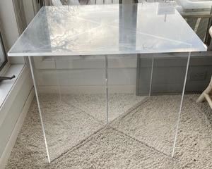 This lovely lucite table measures 30x30x24 inches.
