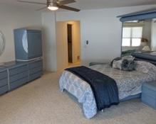 Unique Contemporary Vintage Blue Bedroom Set. There are a few scuffs/scratches that can be seen in the photos, but most pieces are in overall great shape. Includes the bed frame, nightstands, dresser and wall mirror.  Originally purchased at Rosenthal Furniture.

The bed frame measures 81.5” wide and 84” high. The dresser measures 91” wide, 19” deep and 67” high. Please note that the winning bidder is responsible for providing their own help and tools to disassemble/move this item. It is located on the lower level of the residence, but an exit door is nearby.