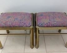 Pair of Vintage Brass Stools. Both have some wear on the brass paint that can be seen in the photos. Each measures 20” wide, 15” deep and 17” high.