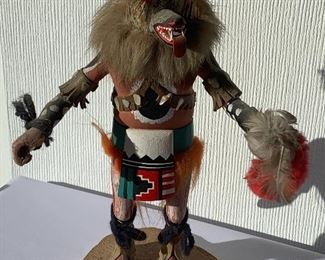 Ikweo Wolf Kachina Figurine. Does have a broken hand. Measures about 11” h 