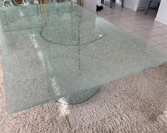 Amazing Crackle Glass Dining Table. A truly beautiful contemporary piece! This item is extremely heavy so the winning bidder should bring extra help to move this item.  Originally purchased at Rosenthal Furniture.

Measures 42” x 72” and 28” high.