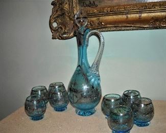 Exquisite venetian glass with silver trim.