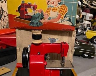 vintage child toy sewing machine in box 