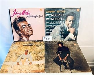 #250 -$6 Each,  Johnny Mathis Albums,  Shadow of Your Smile1966 Good/ Wonderful 1957, Fair/ Love is Blue 1968. Acceptable/ Feelings 1975, Acceptable

