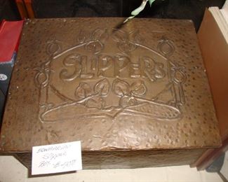 Unusual brass embossed slipper box, ca 1910.