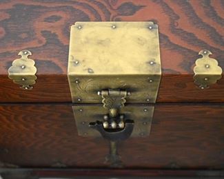 wooden chest with brass hardware