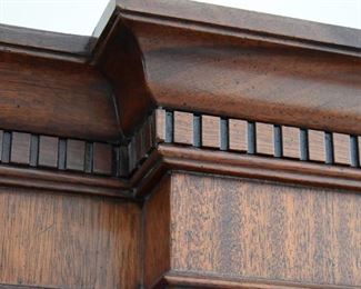 exquisite dental (detail) on china cabinet 