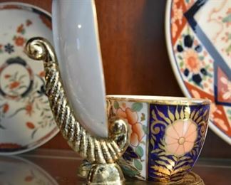 brass tea cup and saucer stand Imari