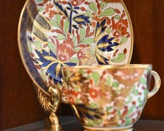 tea cup and saucer on brass stand Imari