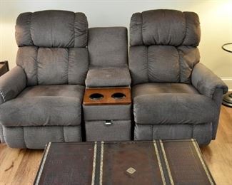 The ultimate in entertainment comfort...upholstered entertainment love seat with drawer storage, USB ports, AC power sockets, electric operation,  and they're  recliners!