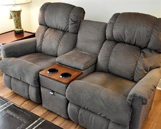 The ultimate in entertainment comfort...upholstered entertainment love seat with drawer storage, USB ports, AC power sockets, electric operation,  and they're  recliners!