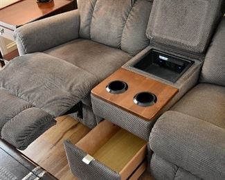 The ultimate in entertainment comfort...upholstered entertainment love seat with drawer storage, USB ports, AC power sockets, electric operation,  and they're  recliners!