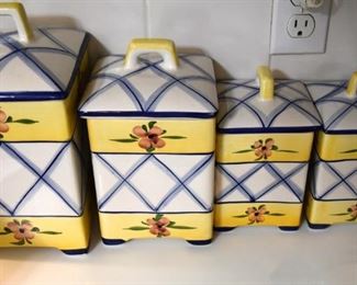 blue and yellow kitchen canisters