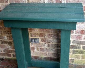 green wooden outdoor table