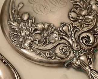 silver brush and mirror 