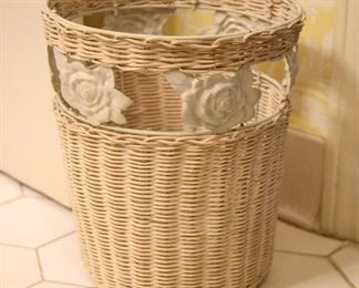 metal roses and wicker waste basket