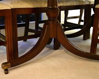 dining table, with band surround, with 8/eight chairs and a leaf (base detail)