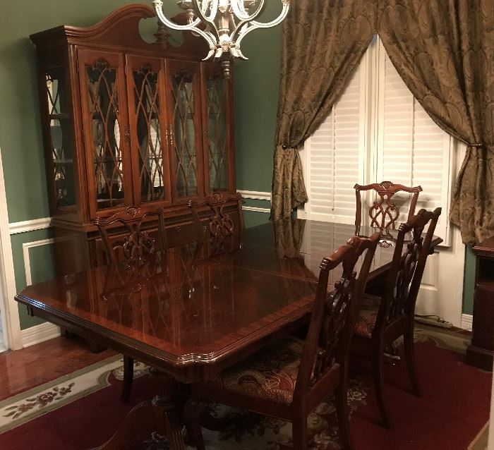 Lighted china cabinet, dining room table and 10 chairs (not  all shown)