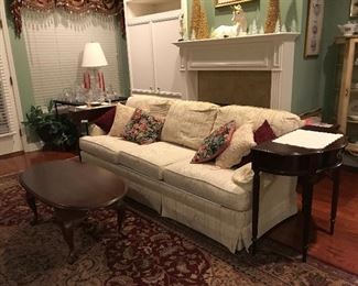 Couch, coffee table, matching half tables (not end tables), oriental rug