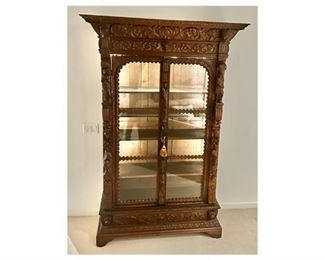 Superb 19th century antique French renaissance revival double-door bookcase or display cabinet circa 1880s.   Hand-carved oak in the Gothic, Renaissance Revival.  Spectacular original condition, including the glass.  Priced at $4500.00