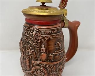 Avon’s Handcrafted Stein. Mint condition and has the official stamp on the bottom. Not a replica. 