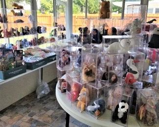 MANY BEANIE BABIES IN CLEAR DISPLAY BOXES - PRE OWNED BY A DEALER - NEVER SOLD BEFORE