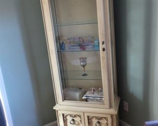 curio  cabinet-  the  cabinet  is  25"  wide,  6' height,  13"  deep