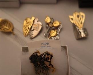 Katz  and  Brandes  pin  pendants