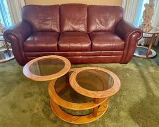 Leather couch
Oak glass top table