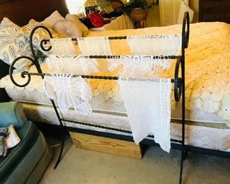 Wrought iron quilt rack 
Lots of doilies