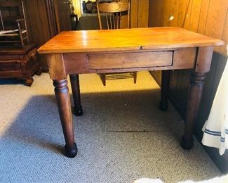Primitive table with turned legs and drawer
