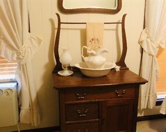 Oak washstand and beveled mirror