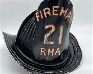Lot 168
Antique Cairns & Bros Metal Fire Helmet and Leather Fire Helmet Emblem