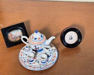 Lot 210
Miniature Porcelain Quimper Style Tea Set