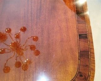 Thomasville, Dining Room Set. Table w/6 chairs, 2 leaves and custom table pads, china cabinet .                                                          Inlaid top of dining room table, excellent condtion