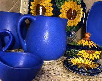 White Stoneware pottery featuring a bright mat finish cobalt glaze named Calidad by Casary of  Mexico; Handmade and hand decorated  vintage sunflower pottery from Mexico 