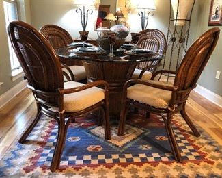Fabulous rattan dining set for four, glass top, Excellent condition, one small chip on the glass top 