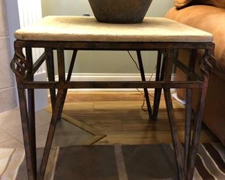 Hand forged iron side table with limestone top; 23” high by 24” square 