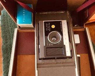 Vintage Polaroid camera and case
Best offers