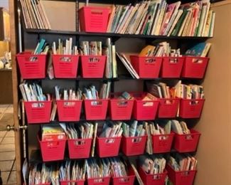 Bins of children’s books (sold as bin group - not individually) Dr Seuss, Holidays, Mother Goose & Nursery Rhymes, Poetry Rhymes, Fairy Tales, Five Senses, Eric Carle,  Pop up Books, Song Books, Animals, Dinosaurs, Home & Family, and many more such groupings.