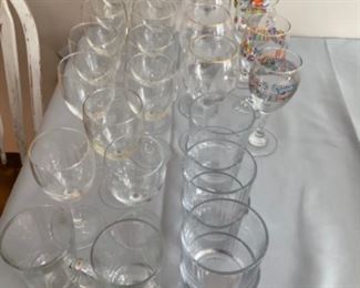 Assorted drink ware and wineglasses