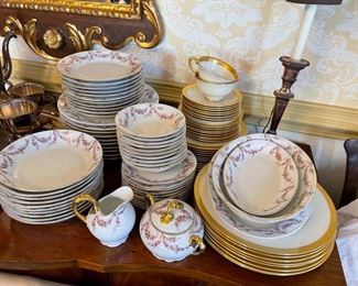 One of six sets of china!  This is a German set of Haviland style china.  White porcelain with pink rose garlands and gold trim.