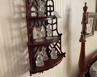 Pretty wood wall display.  Glass Goebel figures on display