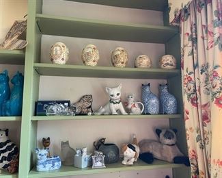 Cat themed urns, plush and ceramic cat items