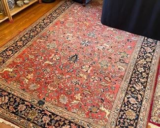 Signed Persian rug-hunt scene