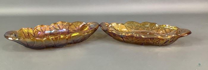 Carnival Glass Candy Dishes
Two matching amber colored carnival glass with a marigold design. 1.5"Hx9.5"Wx5"D. No visible cracks or chips.